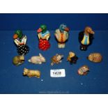 A small quantity of Wade animals, (one a/f), together with four hand painted pottery duck figures.