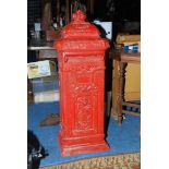 A heavy cast iron Post Box finished in red, 39'' high x 14'' x 12 1/2'' approx.