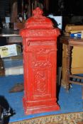 A heavy cast iron Post Box finished in red, 39'' high x 14'' x 12 1/2'' approx.