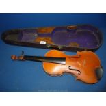 A Violin labelled J. Moores & Co.