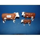 A set of three Border Fine Arts figures of Hereford bull (a/f with leg repaired),