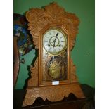 A carved Clock by New Haven clock Co.