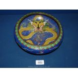 A Chinese cloisonne shallow bowl, blue ground with bright dragons, 10" diameter.