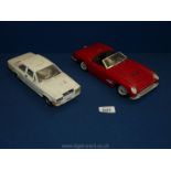 Two vintage model cars including a "Burago" Rolls Royce Camargue and a "Polistil" red Ferrari.