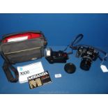 A Minolta 7000 35mm autofocus SLR Camera outfit with a Minolta 28-85mm f/3.5-4.