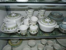 A Noritake Progression part tea set to include a large meat plate and two tureens with lids,