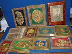 A quantity of Islamic pictures with inlaid 'Khatam' frames.