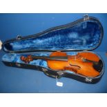 A Violin labelled Bertholini, total length 23" and body 14", (no bow present), in a rigid case.