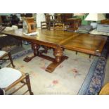 A very heavy Oak Dining Table (believed by I.J & J.