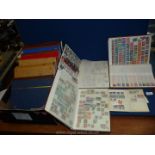 Two empty stock books together with a quantity of stamp stock books including Uganda, Nigeria,