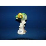 A Beswick Amazon parrot, 6" tall.