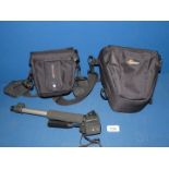 A Lowepro TLZ 1 Zoomster Camera Case, another Lowepro Camera Case and a Hama Monopod.