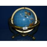 A Gemstone Globe on metal stand with compass in the base, 13 1/2'' tall overall,