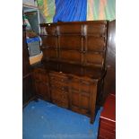 An "Ercol" dark Elm Dresser,