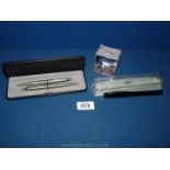 A commemorative boxed Parker pen and pencil and boxed Parker cartridge pen with cartridges.