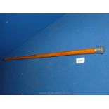 **A white metal topped Cane, engraved with C.G.