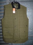 An HSF technical outdoor Gilet in green tweed, size XXL.