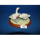 A Border Fine Arts figure of Geese, signed by Ray Ayres.