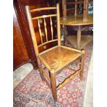 A Clisset type Side Chair having a solid Elm seat,