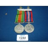A WWII medal and Defence medal.