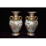 An impressive pair of Satsuma vases, Meiji period,