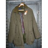 A Grass Roots Country Clothing green tweed coat with zipper and poppers, size M.