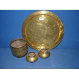 A large brass Charger 16" diameter, a jardiniere and two pots in Middle Eastern design.