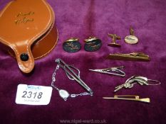 A Links box and contents including a pair of rolled gold cuff links, nail style stick pin,