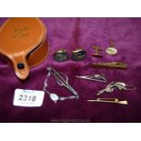 A Links box and contents including a pair of rolled gold cuff links, nail style stick pin,