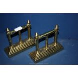 A pair of Brass Fire Dogs,