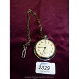 An Ingersoll Pocket watch with chain.