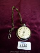 An Ingersoll Pocket watch with chain.