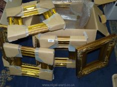 A box of six ornate gilt gesso picture frames of various sizes.