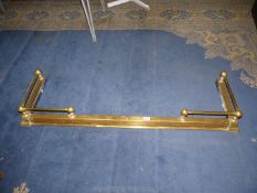 An adjustable brass Fender