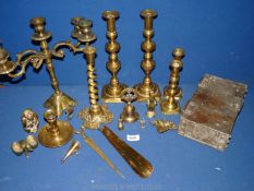 A quantity of brass including candlesticks with pushers, candelabra, wise monkey, chamber stick etc.