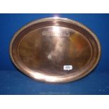 A 1920's copper tray engraved 'Change Sir' 16'' x 12''.