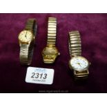 Three ladies watches with expandable bracelets: Quartz, Reflex Quartz and Timex.