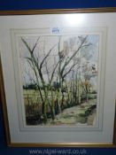 A framed and mounted Watercolour depicting a winter landscape with fields and trees,