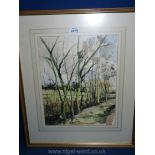 A framed and mounted Watercolour depicting a winter landscape with fields and trees,