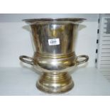 A large silver plated ice bucket, 11" tall.