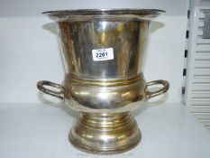 A large silver plated ice bucket, 11" tall.