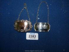 A silver Brandy Sheffield decanter Label and an E.P.N.S. Port label.
