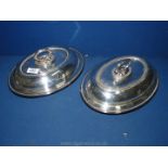Two silver plated Entree dishes with lidded covers.