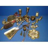 A quantity of small brass ornaments: clock, chair, tankards, cauldron,