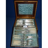 A cased set of Sheffield Silver including twelve dessert Knives and eleven forks with mother of