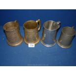 Four brass/white metal tankards with glass bases.