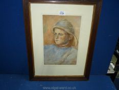 A Watercolour of a youth in a sou'wester initialled and dated 1898.