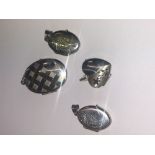 Four assorted silver lockets