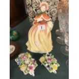 A Royal Doulton figurine and two Doulton posies