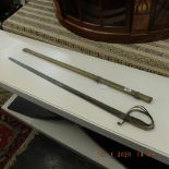 A 19th century sword in brass scabbard